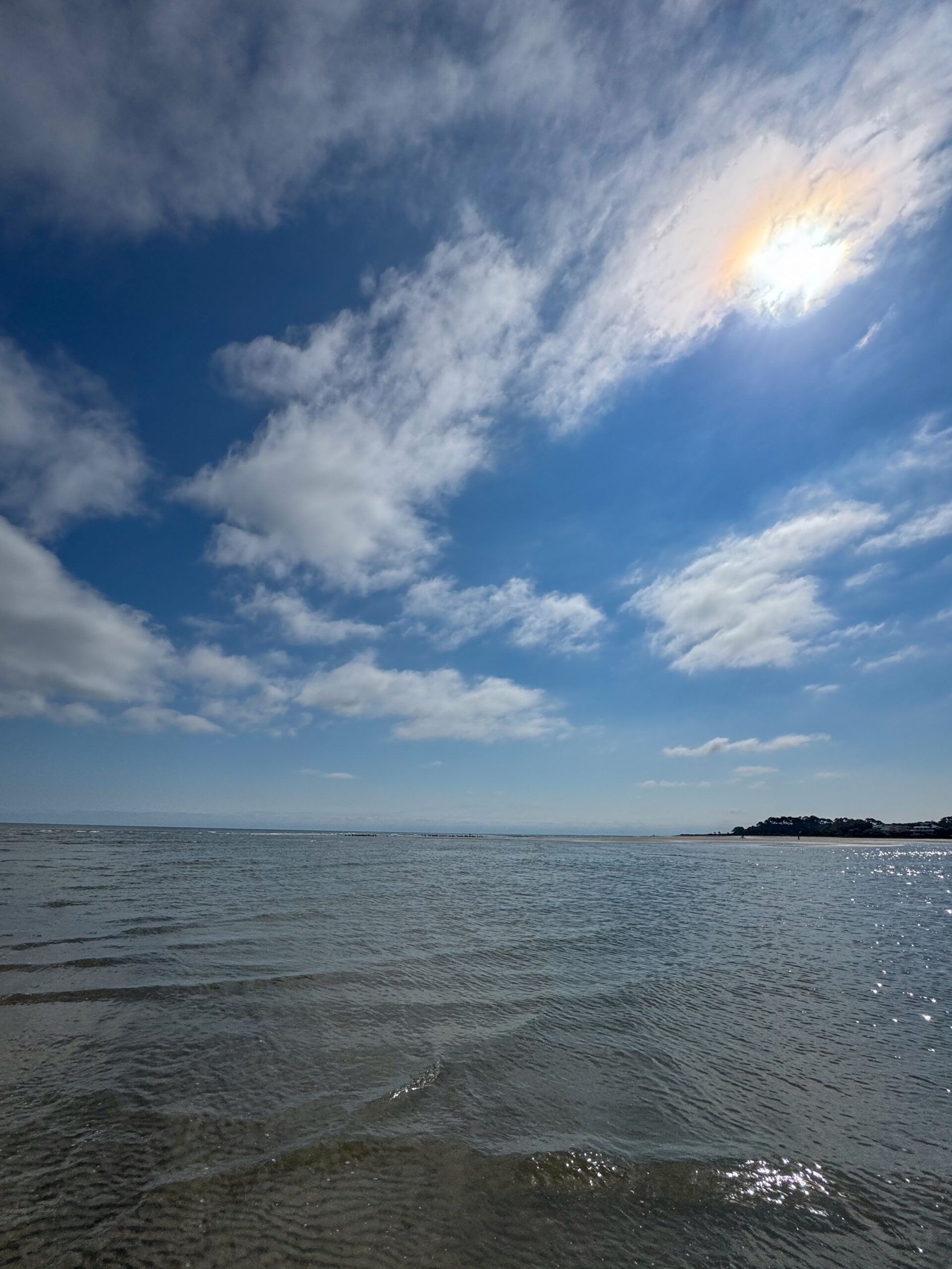 sunlit ocean horizon with rippling water and dramatic clouds artist reference photo