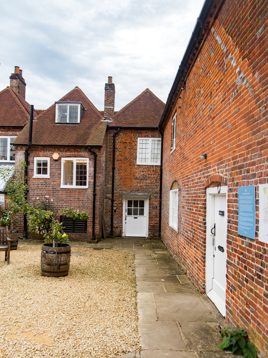 English Brick Courtyard with Gravel Path and Cottage Doors artist reference photo
