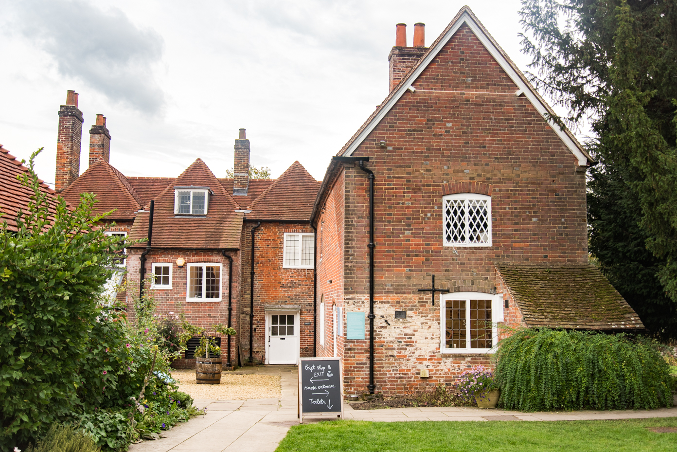 Historic Brick House Exterior with Gable Roof and Garden artist reference photo