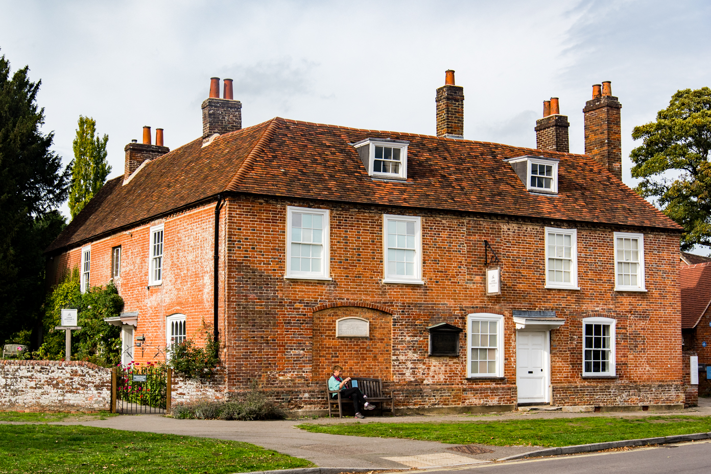 Historic Brick Townhouse with Chimneys and Clay Tile Roof artist reference photo