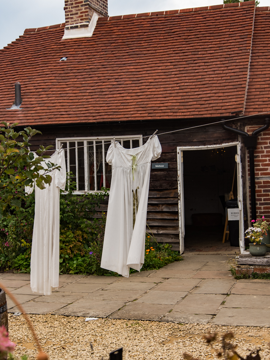 Vintage White Regency Dress Hanging on Clothesline Courtyard artist reference photo